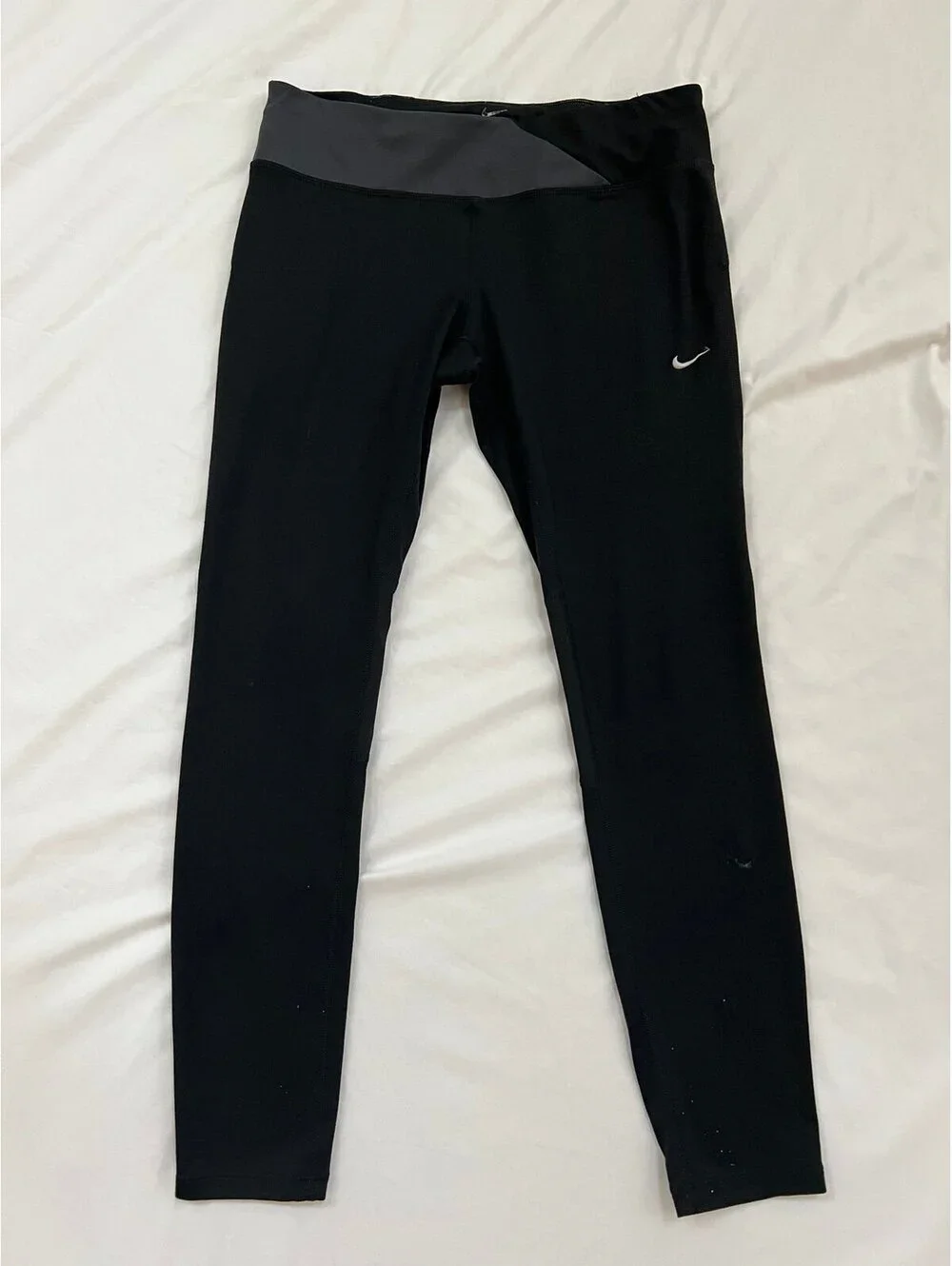 Nike women’s size large black/grey athletic “Twisty Leggings”